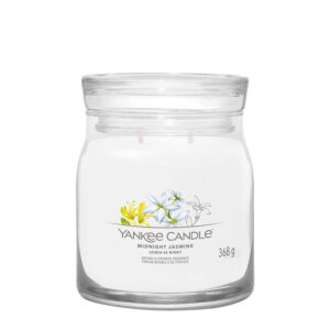 Staklena sveća sa cvetnim motivom i natpisom "Yankee Candle Midnight Jasmine"