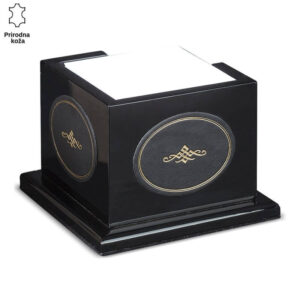 Crna kutija sa ukrasnim elementom od prirodne kože