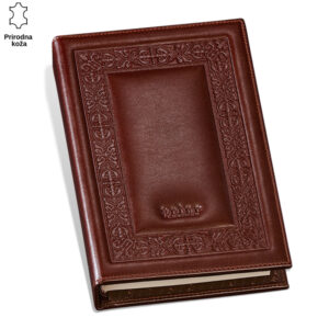 Ručni rad od prirodne kože sa dekorativnim reljefnim detaljima na koricama