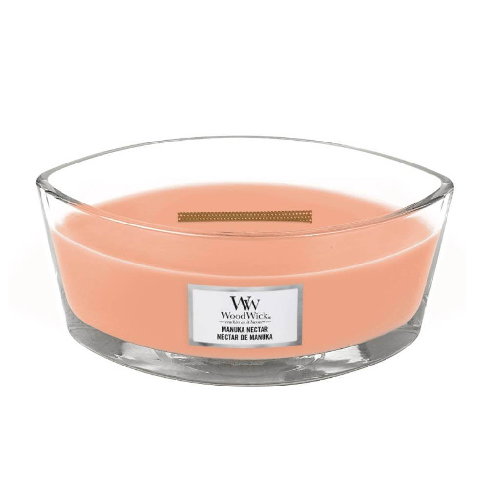 manukanektar Manuka nektar mirisna sveća elipsa. Brenda woodwick, u staklenoj tegli, svetlo narandžaste boje.